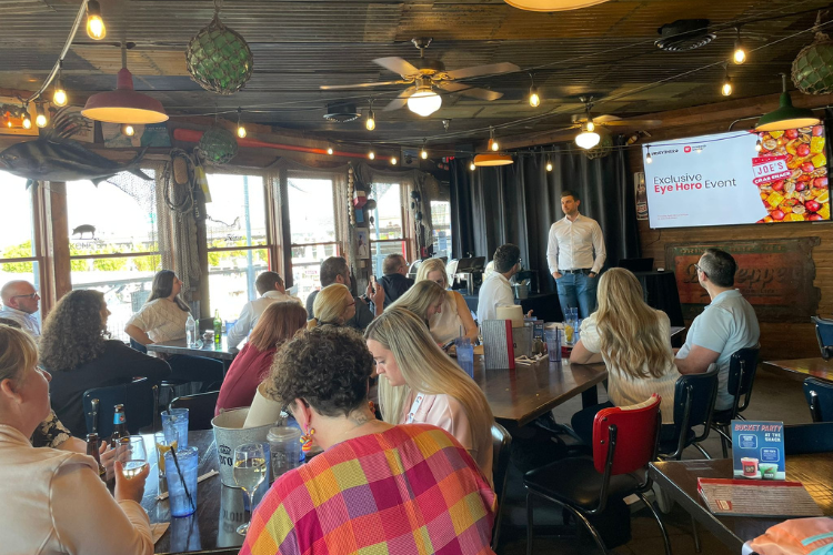 Eye Hero CEO Matic Vogrič delivering the opening presentation at the exclusive Eye Hero event in Louisville