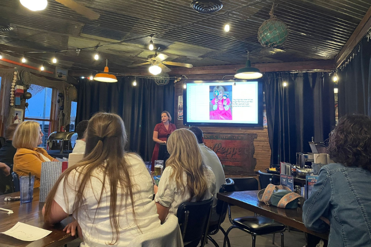 Tamara Petrosyan, Chief of Clinical and Scientific Affairs at Eye Hero, delivering a lecture to attendees in Louisville