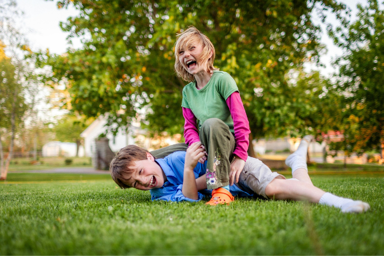 Child spending outdoor time to support healthy vision